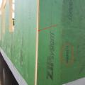 Right – This coated OSB sheathing product is available with an integrated insulation layer.