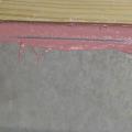 Right – The joint between the foundation wall and the mud sill is thoroughly sealed with a liquid-applied sealant.