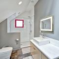 A solar tube provides more natural light while maintaining privacy for this bathroom. 