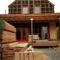 Furring strips provide a mounting surface for siding over the smart house wrap membrane which serves as a drainage plane over cork insulation installed on the exterior of this home. 