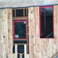 Staggering sheathing seams makes it harder for moisture to infiltrate the wall to the air gap, where furring strips will allow permeating moisture to drain if needed.