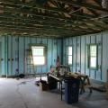 Right- This concrete block home in the hot-humid climate is insulated on the interior with rigid EPS foam; all framing uses mold- and termite-resistant borate-treated lumber.