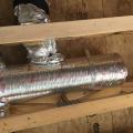 Wrong – Insulation should not be pinched where flex ducts connect to the trunk duct as compression of the insulation here can lead to cold spots and condensation on the duct surface.