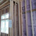 Right – This builder installs 1 inch of XPS rigid foam on the exterior of the 2x6 walls then covers the foam with ½-inch plywood sheathing, which serves as a nailing surface for siding and trim.