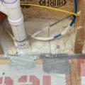 Wrong – When insulating with spray foam, care should be taken to completely fill areas around piping and other penetrations to avoid leaving air gaps. 