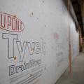 Right – Even house wrap is installed in the factory for these modular homes where each floor is factory assembled. 