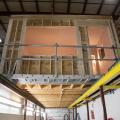 Right – These modular homes are constructed in a factory that provides easy, ergonomic access to typically hard-to-reach areas of the home including under the floor.