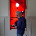 Right – The energy rater used a window to test whole-house air leakage with this blower door testing equipment. 