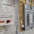 Right – The builder provided adequate wall space for the solar inverter next to the home’s electric panels. 