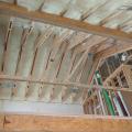 Right – Spray foam fills the roof joist cavities of this vaulted, unvented attic.