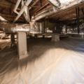 The floor of the sealed insulated crawlspace is covered with a heavy plastic vapor-barrier sheathing that is taped at all seams and around the foundation piers to prevent water vapor from moving into the crawlspace.