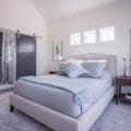 For better temperature distribution and air quality, every bedroom and all of the common spaces in this home have ducted returns to the central heat pump and all bathroom exhaust fans are controlled by a condensation sensor and timer switch. 