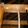 All holes through the top plates should be sealed with canned spray foam to prevent conditioned air from leaking into the attic.
