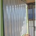 Right - Aluminum accordion coverings are permanently installed and can be deployed quickly but must be manually closed from the outside.