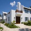 Light-colored roofs and walls and deep overhangs for shade are some of the features used by builders in the hot-humid climate (Source: Alys Beach Construction).