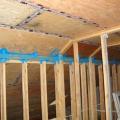 The seams in the plywood are taped seams in the cathedral ceiling serve as part of the advanced home sealing strategy.