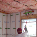 The batt insulation shown here was properly installed to fill the ceiling cavities.