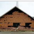 Wrong – This brick veneer failed in high winds (107 mph) because the ties pulled out of the substrate. 