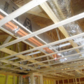 CPVC fire sprinkler piping insulated using the box-in method.