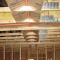 CPVC fire sprinkler piping is insulated using the tent method, as described in NFPA 13D.