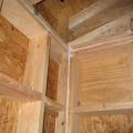A large bead of caulk is installed on the interior surface of the wall top and bottom plates to provide an air sealing gasket between the framing and the dry wall.