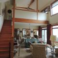 Thermal mass stained concrete slab absorb solar heat during the day and release it into the rooms at night.