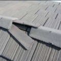 Wrong - Displaced concrete tiles can allow ember entry.