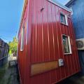 Right - The corrosion-resistant metal siding on this tiny house is fire resistant.