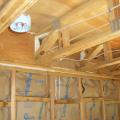 Foam holes in open-web floor trusses to completely seal the rim joist