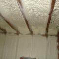 Right - A “flash” seal approach with spray foam provides a continuous air barrier between the ceiling and walls of the garage and the living space