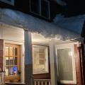 Snow and ice buildup over doorways can be a source of injury for occupants.