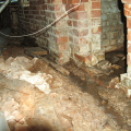 Wrong - A typical vented crawlspace in North Carolina exhibits water leakage, poor drainage, and a low-quality vapor retarder that does not cover all of the ground surface and is not sealed to the walls. 