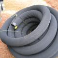 Drain tile with protective cover