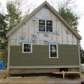 Drainage and back ventilation of wood cladding is provided by ¾ inch furring (1x4).