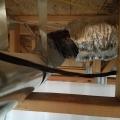 Wrong - Duct insulation and vapor barrier do not cover all of the flex duct.