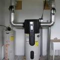 This heat pump water heater has been fitted with ducts to exhaust its waste cooling into the occupied living area