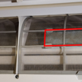 This ductless wall-hung indoor unit has supplemental air filters (outlined in red), which only filter a portion of the airflow; most of the air bypasses the supplementary filters and only passes through the standard mesh filters.