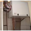 Right - Each individual unit in this multifamily building has its own energy recovery ventilator (ERV) to provide balanced ventilation to the dwelling 