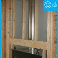 Right –  Rigid air barrier is installed behind fireplace