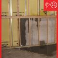 Untreated lumber has been used on a below-grade wall against masonry