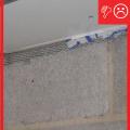 The water-resistant barrier, weep screed, and stucco lathe are not properly layered
