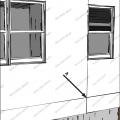 House wrap is sealed at all seams and overlaps flashing to serve as a continuous drainage plane over the exterior walls.