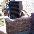 Right – This HVAC condensing unit is elevated on a raised-slab