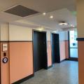 Right – The elevator lobby of this multistory building is pressurized with outdoor air supplied to the space through this ceiling supply register. 