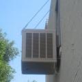 Right - This evaporative cooler is wall mounted to reduce leak effects and allow for ease of maintenance.
