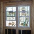 This wall and window assembly has excessive framing around the windows, which can lead to heat gain in how climate zones. 