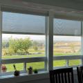 External solar screens are an effective way to reduce solar heat gains through windows while maintaining view.
