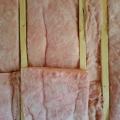 Wrong - Fiberglass insulation is poorly installed in wall cavities.