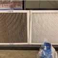 A comparison of a dirty furnace filter on left and clean filter on right. Dirty filters block airflow and make the furnace or air handler work harder.