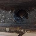 Wrong - Floor register has not been cleaned, allowing trash and debris to build up.
